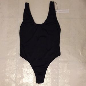 Selling a medium Coulbourne ( 1 ) piece NWT